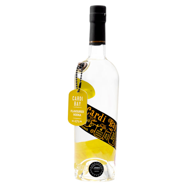 A 70cl bottle of Eccentric Spirit Co's Cardi Bay Welsh Flavoured Vodka with a white background. Our Welsh flavoured vodka has a yellow dog tag dangling from the bottle and a distinctive yellow and black label, which screams of what inspired the Welsh vodka's creation - gorse, which grows along the Ceredigion coastline.