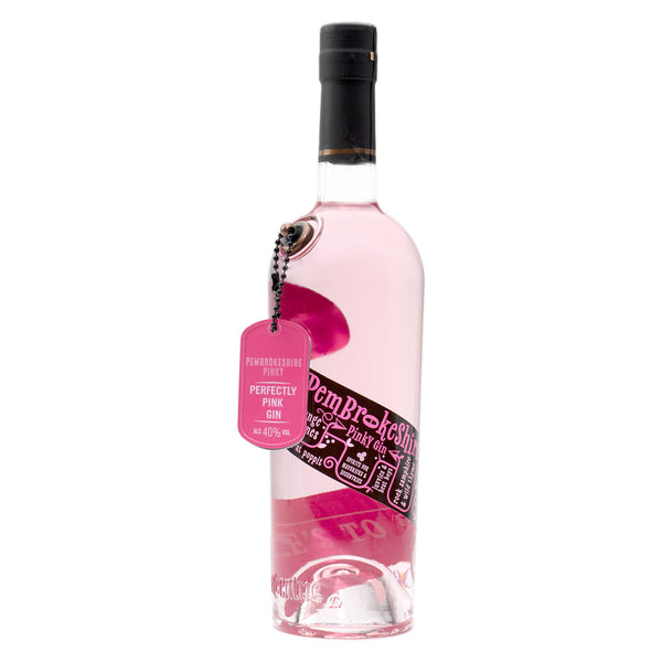 A 70cl bottle of Eccentric Spirit Co's Pembrokeshire Pinky Welsh Gin with a white background. Our Welsh pink gin has a vibrant pink dog tag dangling from the bottle and a distinctive pink and black label, which screams of what inspired the creation of our Pembrokeshire Pinky Welsh Gin, which is named after the flower of Pembrokeshire - the Pink Thrift.